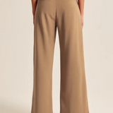 Paulina | Pantalon à jambes larges et plis – élégance à chaque pas